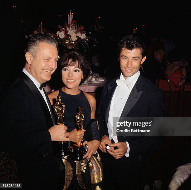 Academy Awards Party 1962: L-R are Robert Wise; Rita Moreno; and George Chakiris. Wise was the Director of Best Picture, with Moreno and Chakiris as...