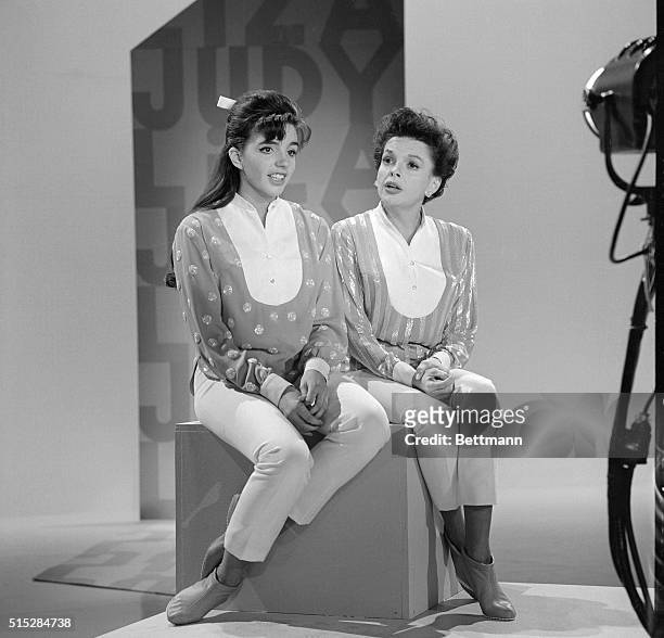 Liza Minnelli is shown with her mother, Judy Garland, as the two rehearse for her mother's new television show , in which Judy and Liza sing and...