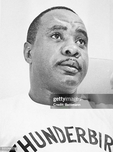 Las Vegas: Sonny Liston and Floyd Patterson on the eve of their 15-round rematch for the heavyweight title fight, to be held at Convention Center...