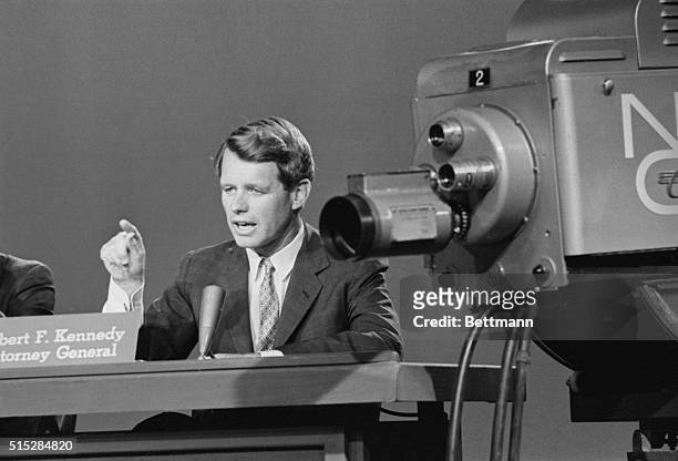 Attorney General Robert Kennedy gestures during a nationwide television interview . The Attorney General said that President Kennedy will push his...