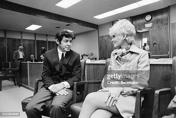 Santa Monica, California: Together And Apart--Singer Eddie Fisher and actress Connie Stevens chat in court at Santa Monica, California, June 12th a...