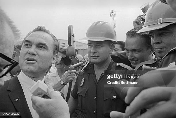 Governor George C. Wallace, surrounded by Alabama state troopers, arrived here to keep his promise to Alabama voters "to stand in the schoolhouse...