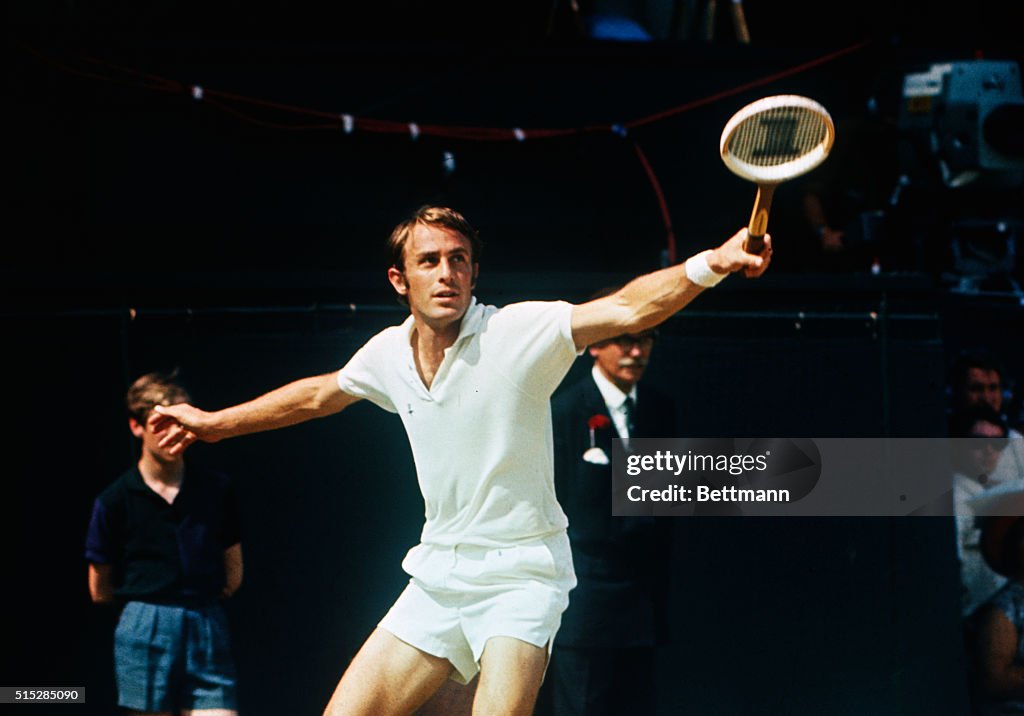 John Newcombe Delivering a Backhand