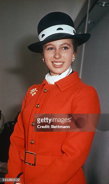 London, England: As she grows up, Princess Anne of Great Britain takes on added responsibilities. She is wearing a smart hat and colorful red coat in...
