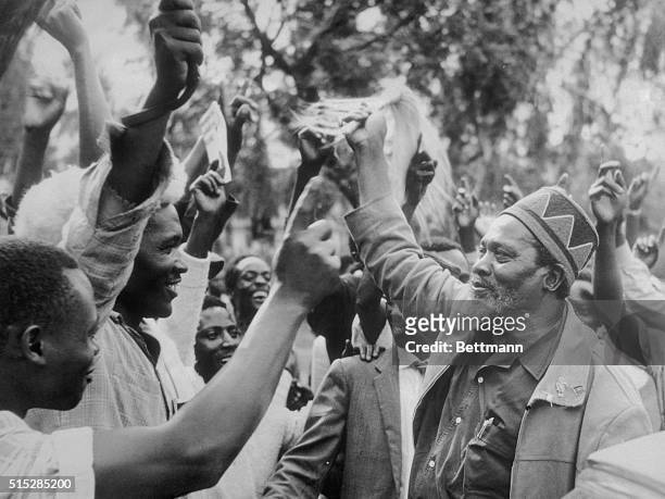 Newly elected Prime Minister Jomo Kenyatta joins in victory celebrations here on May 28th after his Kenya African National Union won 62 out of 112...