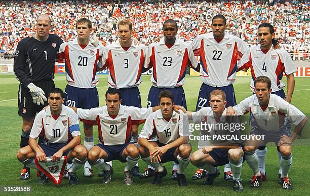 Line up for a team photo, 17 June 2002 at the Jeonju World Cup Stadium in Jeonju, ahead of second round playoff action between Mexico and USA in the...