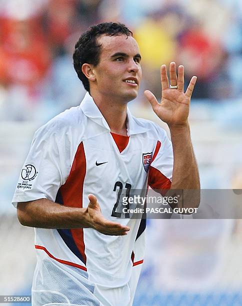 S Landon Donovan celebrates, 17 June 2002 at the Jeonju World Cup Stadium in Jeonju, following second round playoff action between Mexico and USA in...