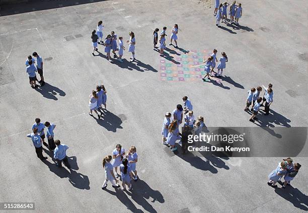 groups of children on playground - cliqueimages stock pictures, royalty-free photos & images