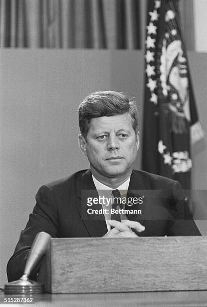 President Kennedy addresses the nation by radio and TV from his office in the White House tonight, in the wake of the crisis over admitting two...