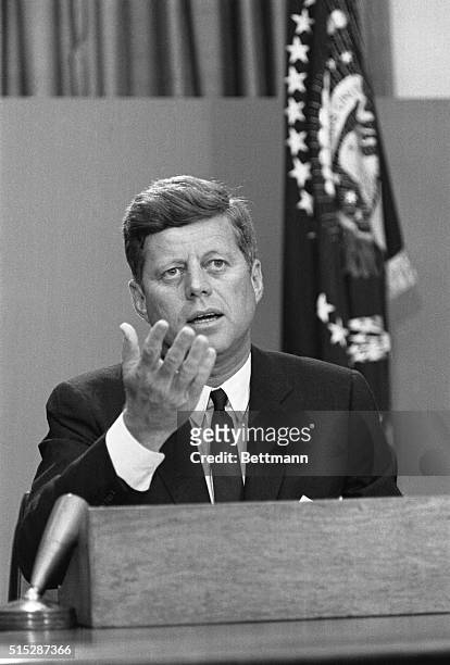 President Kennedy addresses the nation by radio and TV from his office in the White House tonight, in the wake of the crisis over admitting two...