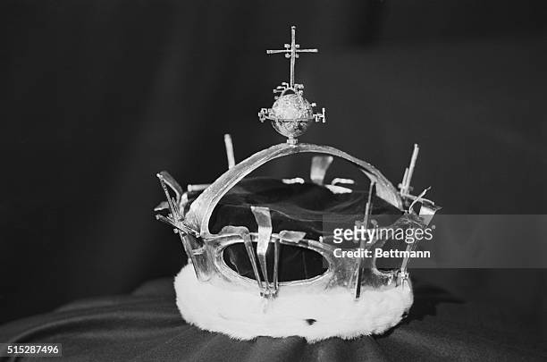 The nearly completed coronet which will be used for the investiture of Prince Charles July 1st, is shown here publicly for the first time by Louis...