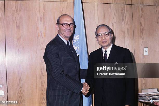 United Nations, New York: David A. Morse, , Director of the International Labor Organization , receives the congratulations of UN Secretary General U...