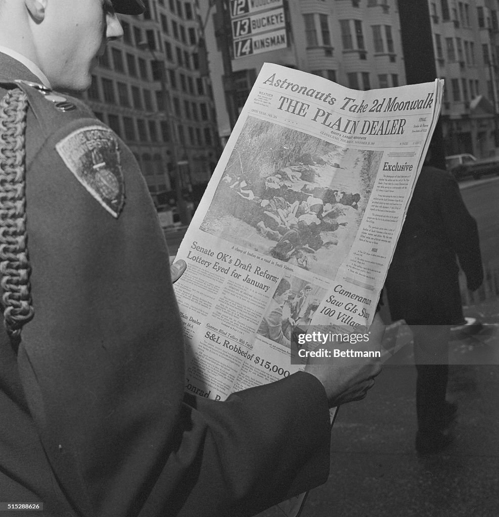 Officer Reading Newspaper