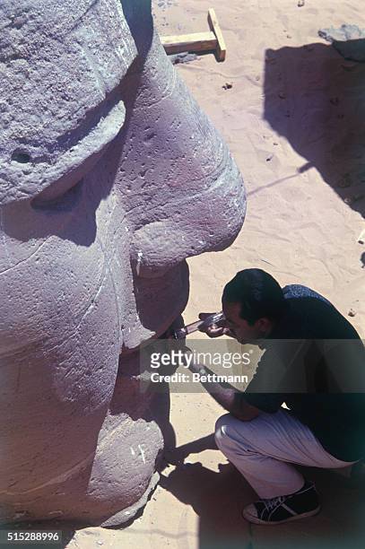 Abu Simbel. United Arab Republic. Workmen are busy re-assembling the giant pieces of sculpture of the famous temples of Abu Simbel. The Mammouth...