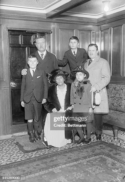 Sir Arthur Conan Doyle with his wife and sons, Denis and Malcom and Miss lina Conan Doyle his daughter. William J. Burne, right, greet the...
