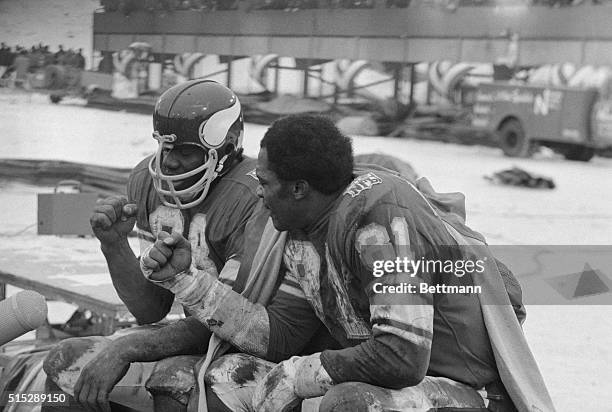 Minneapolis: Carl Eller and Alan Page clench fists on the Vikings bench shortly after Page intercepted a L.A. Rams pass in the closing minutes of...