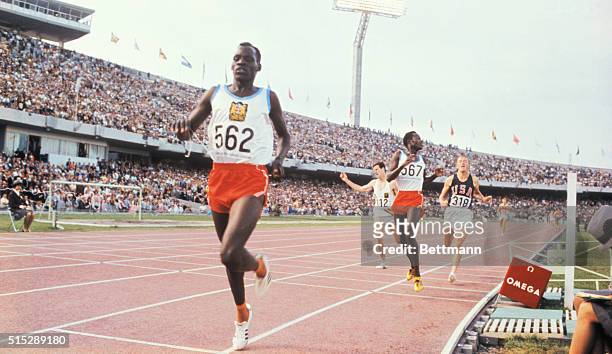 Mexico City: Amos Biwott , winning the 3,000-meter Steeplechase. Second was Benjamin Kogo, also of Kenya and in third place is George Young of the...