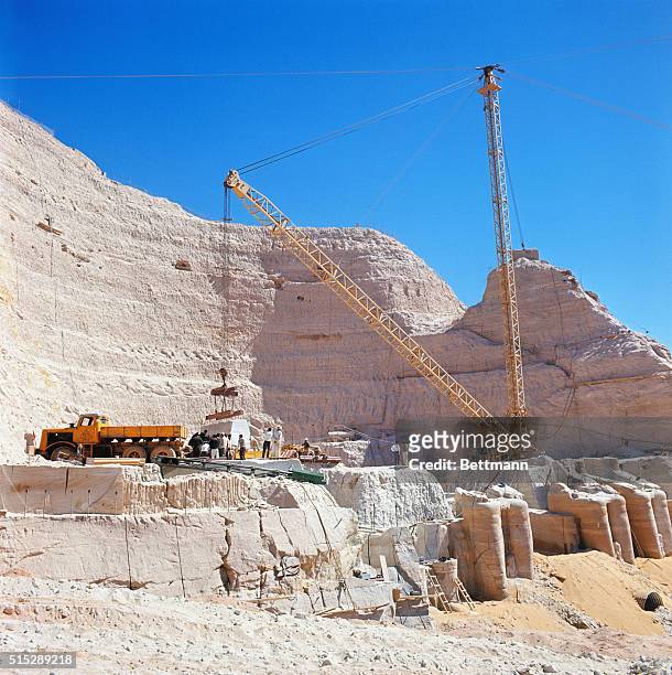 Abu Simbel, U.A.R. The site of Old Abu Simbel temple and the cavity in the rock after the temples were chopped up and moved to higher ground. Workmen...
