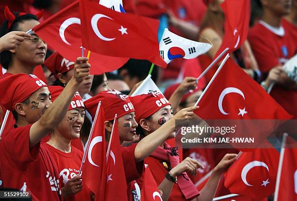 Fans show their support for Turkey, 29 June 2002 at the Daegu World Cup Stadium in Daegu, ahead of the third-place playoff between Korea and Turkey...