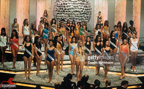 London: Entrants in "Miss World 1969" contest stand in bathing suits during finals of contest at Royal Albert Hall here. Winner was Miss Austria Eva...