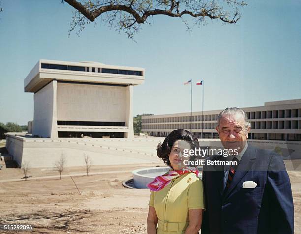 Austin, TX: Former President and Mrs. Lyndon B. Johnson stand before the Lyndon B. Johnson Library on the University of Texas campus. The Library...