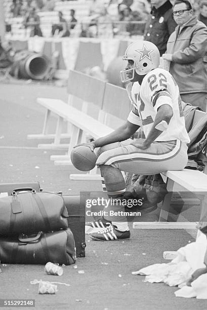 Dallas Cowboys wide receiver Bobby Hayes, , sits on the bench holding the football he caught for his fourth touchdown in the 52-10 Dallas defeat of...