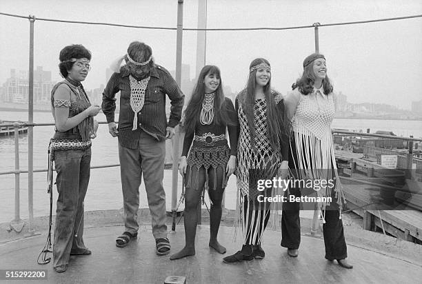 Students from the Fashion Institute of Technology are shown here modeling Postek's art, which includes "macrame" designs, aboard the Ambrose...