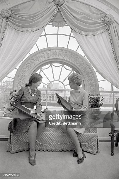 Washington, DC- Pat Nixon confers with Connie Sturart, her Staff Director, on the second floor of the White House, where the family has its living...