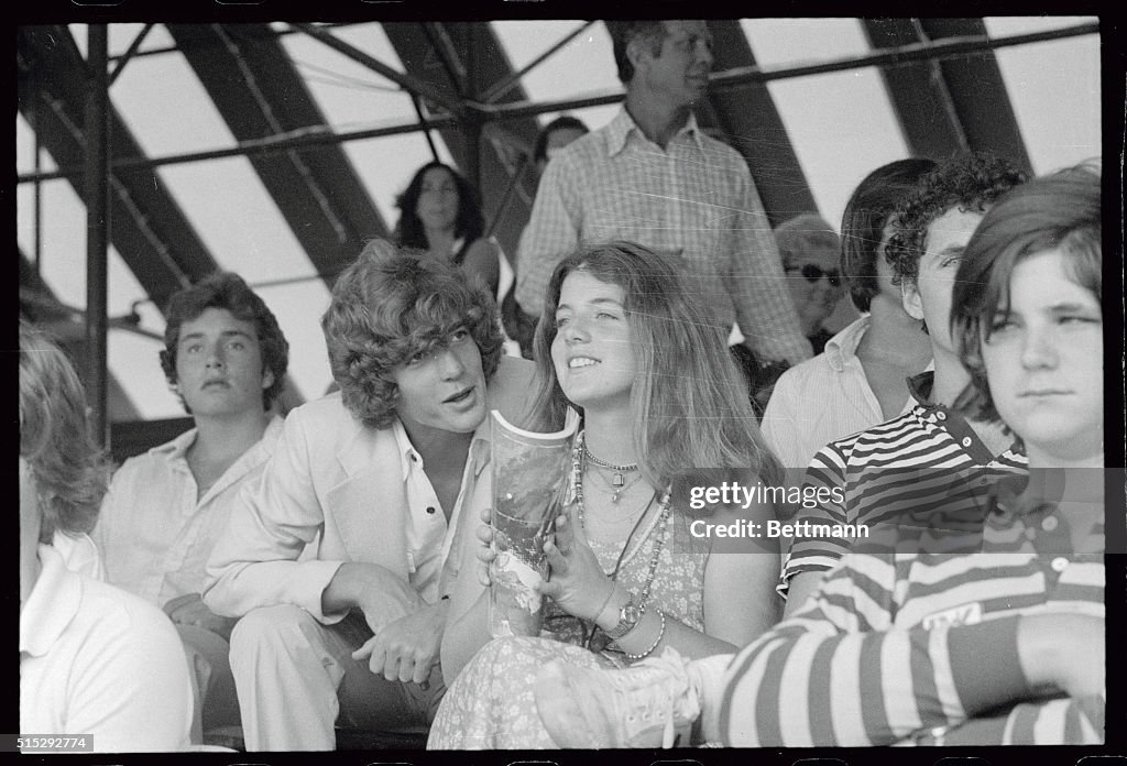Younger Caroline and John Fitrzgerald Jr. Sitting in Tennis Tournament Stands