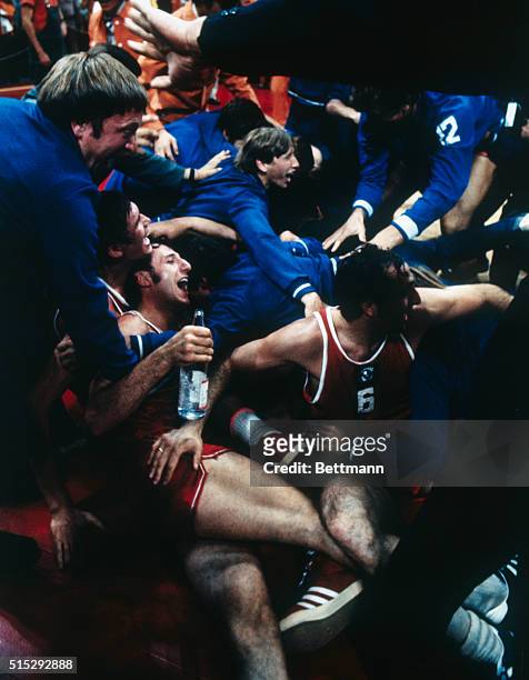 Munich, Germany. Happy Soviet players celebrate their win against USA in the exciting Olympic final game in basketball, giving the Soviets the gold...