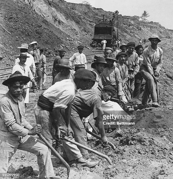 While labor-saving machinery helped greatly in building the Panama Canal there was still much manual labor needed. As seen in this 1909 photo,...
