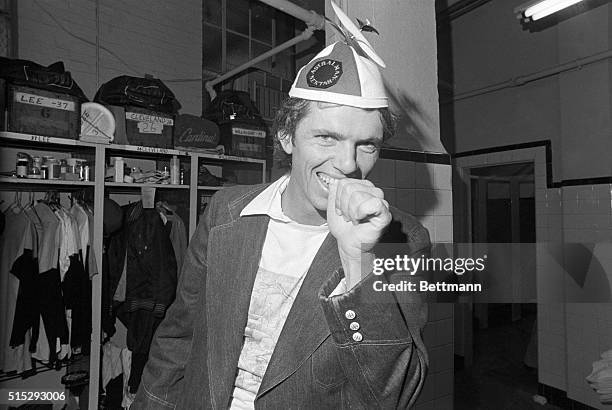 Boston: Bill Lee clowns around the Red Sox dressing room after his team won the World Series opener against the Reds, 6-0. Lee, a left hander, wears...