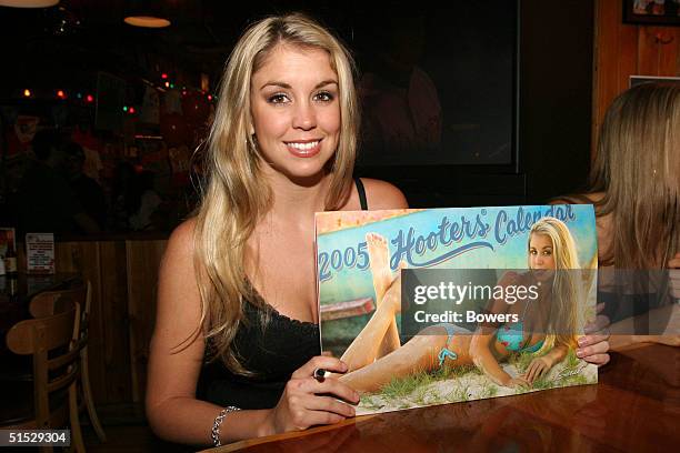 Cover girl Sarah attends the Hooters girls calendar signing event at Hooters restaurant October 21, 2004 in New York City.