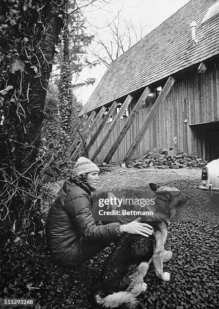Portland Trail Blazers rookie center Bill Walton pats the head of 'Sigmund,' a 12-year-old German Sheppard in front of his house 3/19. Bill is taking...
