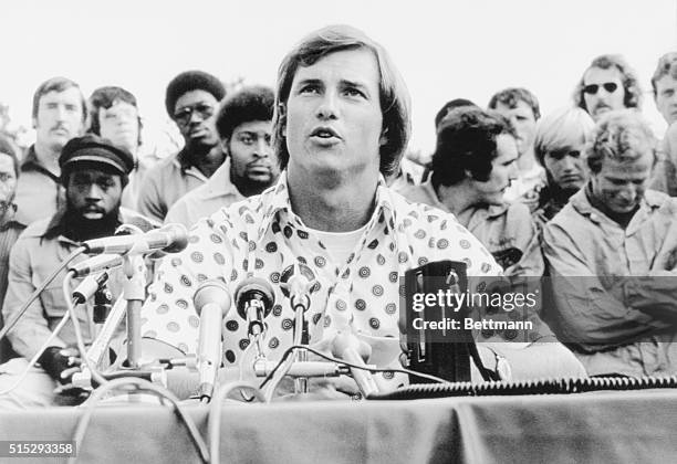 September 14, 1975 - Foxboro, Massachusetts: New England Patriot's player represetative Randy Vataha, Patriots' players in the background, said the...