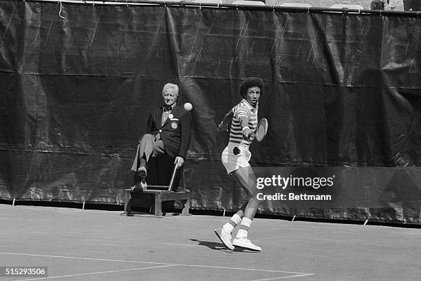 Arthur Ashe, the Wimbledon champion backhands a return to Victor Amaya in the first match August 27th of the $309,000 US Open tennis Championships....