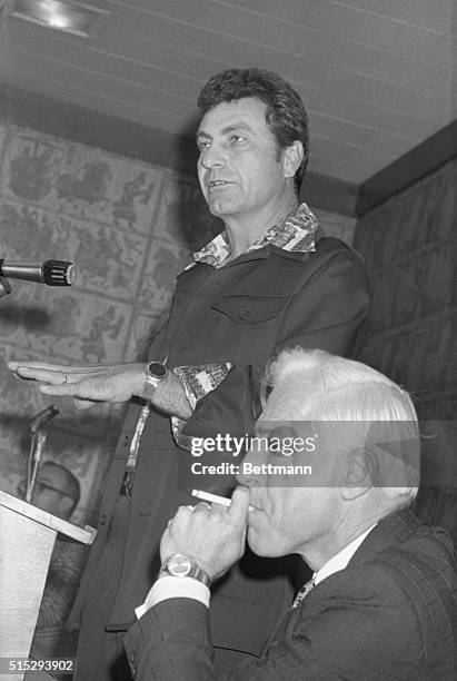 Red Sox manager Darrell Johnson gestures during joint press conferences 10/15 with Reds' manager Sparky Anderson while waiting for game of the World...