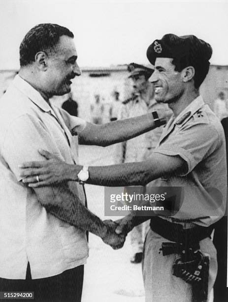 Egyptian President Gamal Abdel Nasser greets Libyan leader Colonel Muammar al-Qaddafi during a surprise meeting 9/17 at this Mediterranean resort...