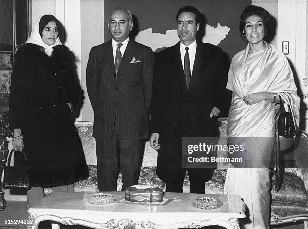 Left to right, Mrs. Muammar al-Qaddafi, Pakistan Pres. Zulfikar Ali Bhutto, Libyan Pres. Moammar El-Khadafy and Mrs. Bhutto at the Guest Palace.