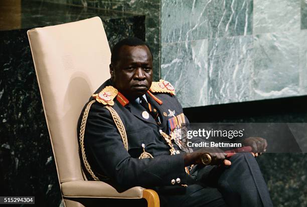 Ugandan President-for-Life Idi Amin sits listening to the text of his speech being delivered by the Ugandan UN ambassador. Amin's brief introduction...