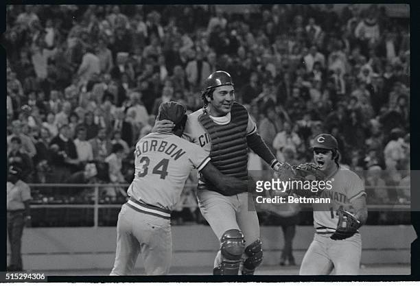 Relief pitcher Pedro Borbon, catcher Jonny Bench and third baseman Pete Rose celebrate victory over the Pirates 10/7.