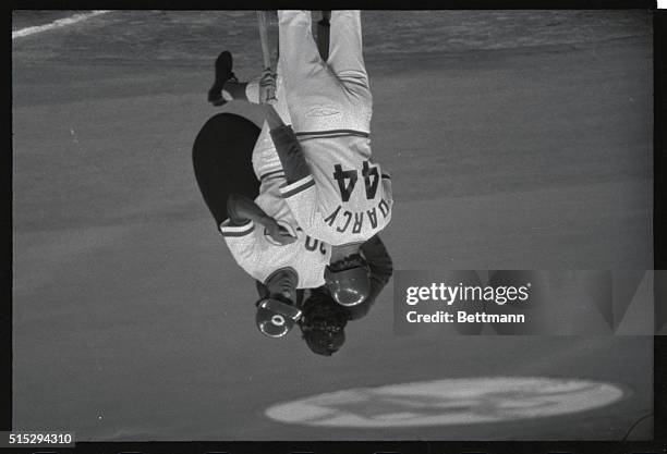 Cesar Geronimo is congratulated by Pete Rose on his home run in the fifth inning against the Red Sox in game of the World Series. Rose hit a triple a...