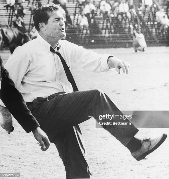 S football coach, Hayden Fry, appears to have gotten quite a kick out of Texas' touchdown, as the Longhorns rolled up a 7-0 victory over SMU.