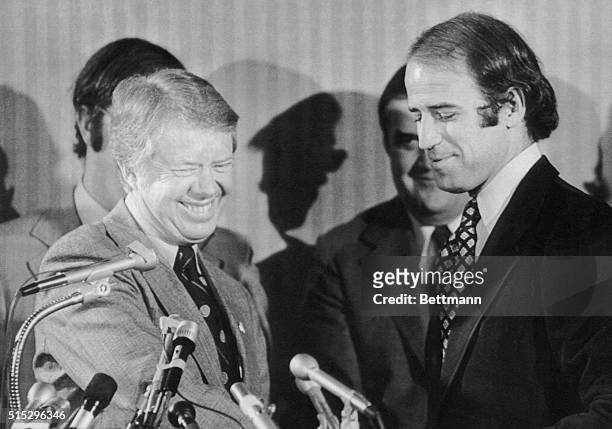 Presidential candidate Jimmy Carter accepts the support of Senator Joseph Biden, D-Del, at a news conference in the Sheraton Hotel in Madison.