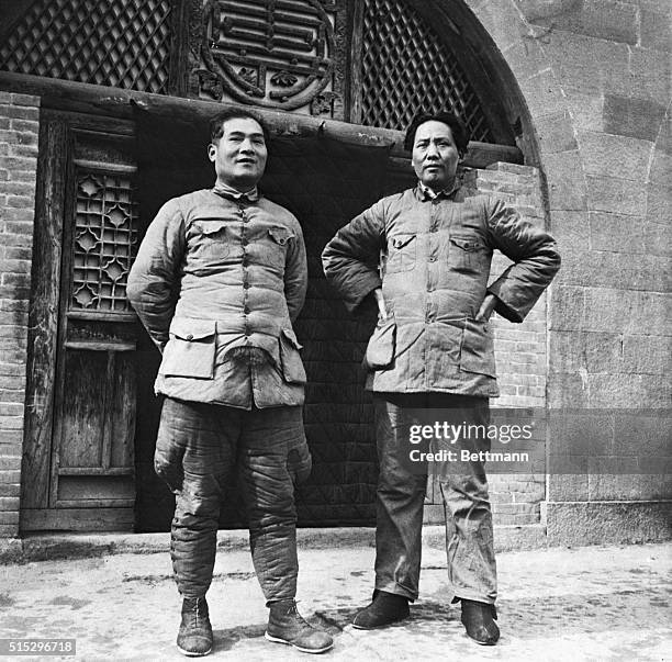 Yenana, North Shensi Province, China--China's Stalin, Gen Mao Tse-Tung, and his comrade, Pres Chang Kuo-Tao, of the new "frontier government" pose...