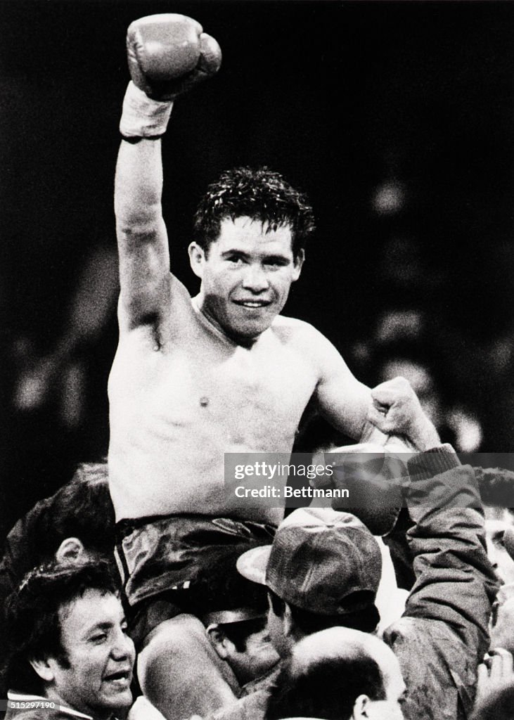 Julio Cesar Chavez Raises Gloved Arm