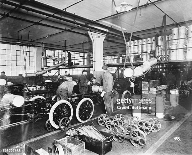 Men at work at the Ford Motor Co. Undated b/w photograph.