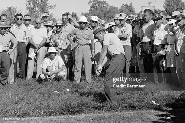 Las Vegas, NV- Butch Baird chips from heavy grass off the 18th green on the opening day of the 1962 Tournament of Champions. Baird, who held a...