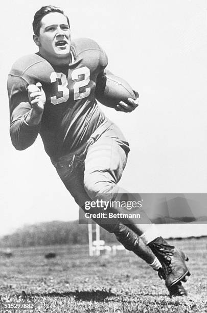 New York, NY - Johnny Lujack, quarterback of Notre Dame's unbeaten eleven, has been chosen as the outstanding college football player during 1947 and...