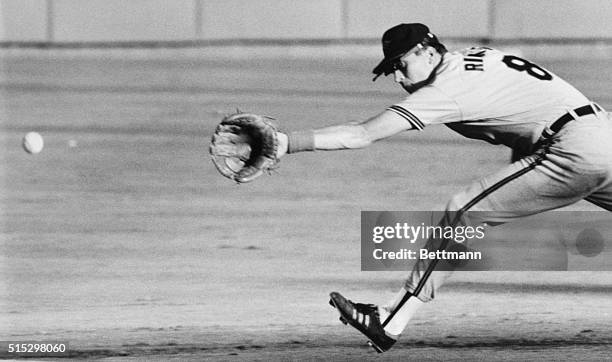 Arlington, TX- Baltimore's Cal Ripken, Jr., stretches but can't quite get to a ground ball hit by Texas' Chad Kreuter during third inning action in...